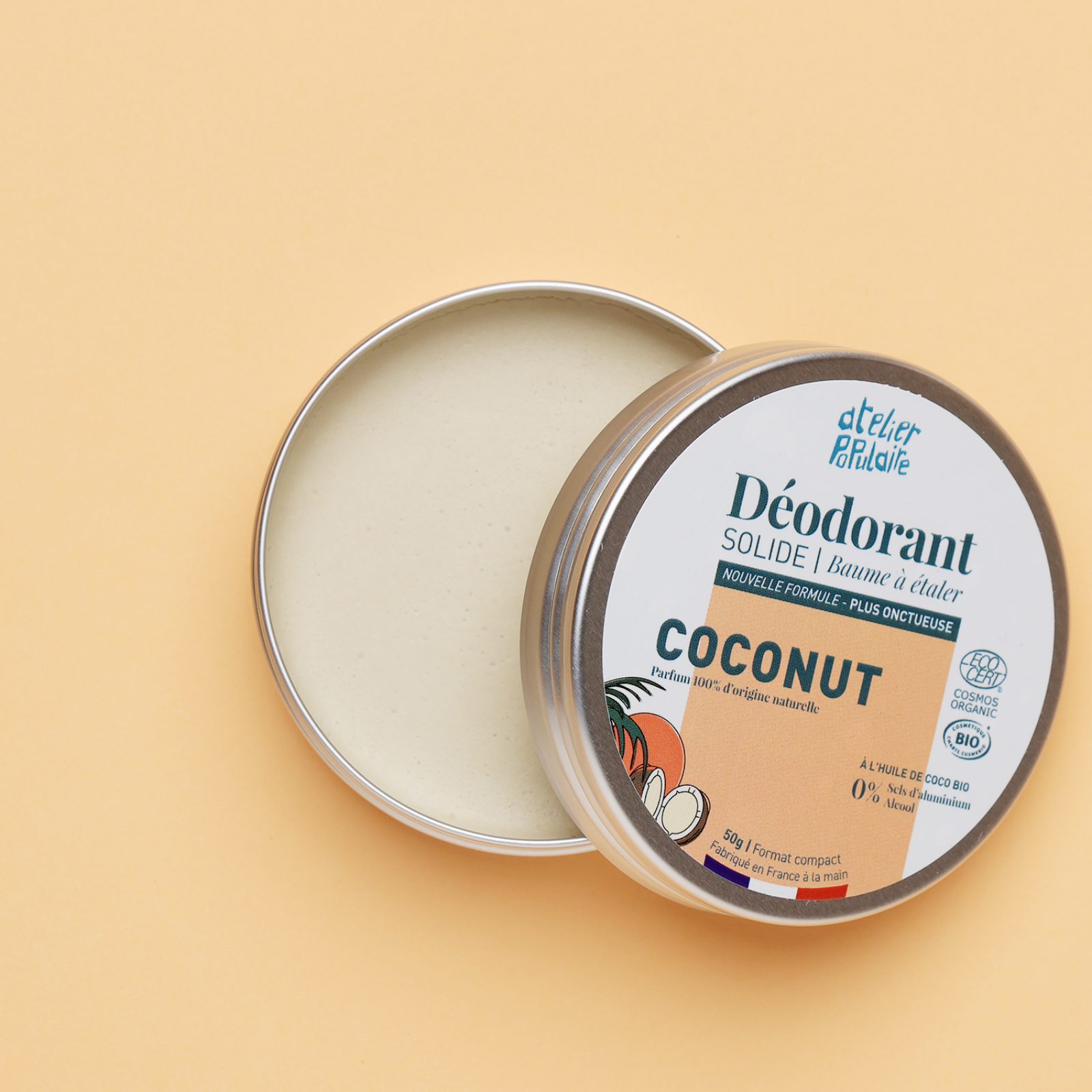 Coconut deodorant tin with certification marks visible on the label